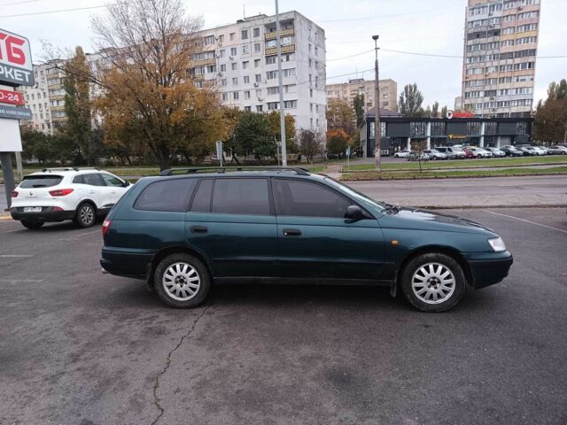 Зелений Тойота Carina E, об'ємом двигуна 1.6 л та пробігом 290 тис. км за 2300 $, фото 3 на Automoto.ua