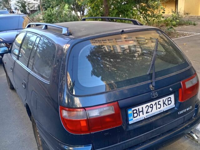 Зелений Тойота Carina E, об'ємом двигуна 1.8 л та пробігом 278 тис. км за 3000 $, фото 1 на Automoto.ua