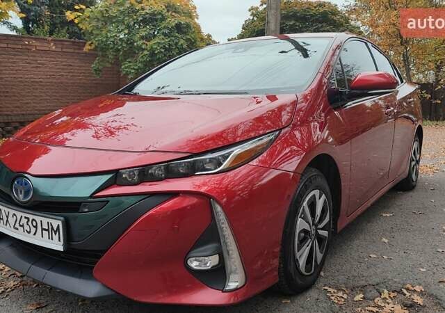Красный Тойота Prius Prime, объемом двигателя 1.8 л и пробегом 81 тыс. км за 18000 $, фото 1 на Automoto.ua