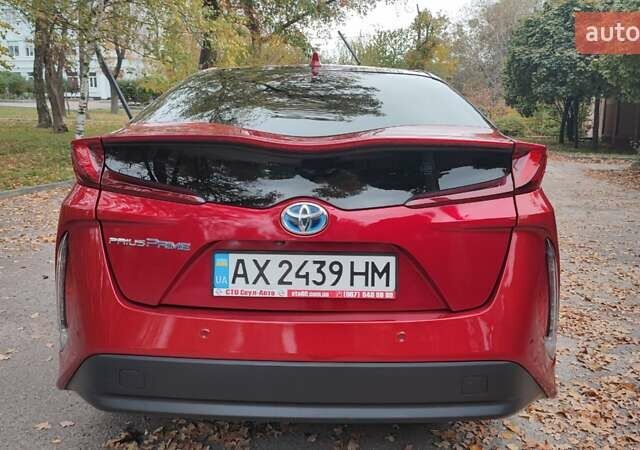 Красный Тойота Prius Prime, объемом двигателя 1.8 л и пробегом 81 тыс. км за 18000 $, фото 4 на Automoto.ua