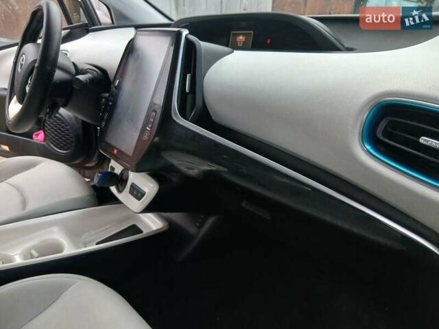 Серый Тойота Prius Prime, объемом двигателя 1.8 л и пробегом 150 тыс. км за 18490 $, фото 21 на Automoto.ua
