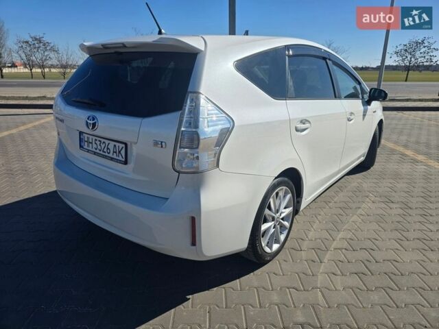 Білий Тойота Prius v, об'ємом двигуна 1.8 л та пробігом 164 тис. км за 14300 $, фото 7 на Automoto.ua