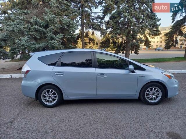 Синий Тойота Prius v, объемом двигателя 1.8 л и пробегом 230 тыс. км за 12700 $, фото 6 на Automoto.ua