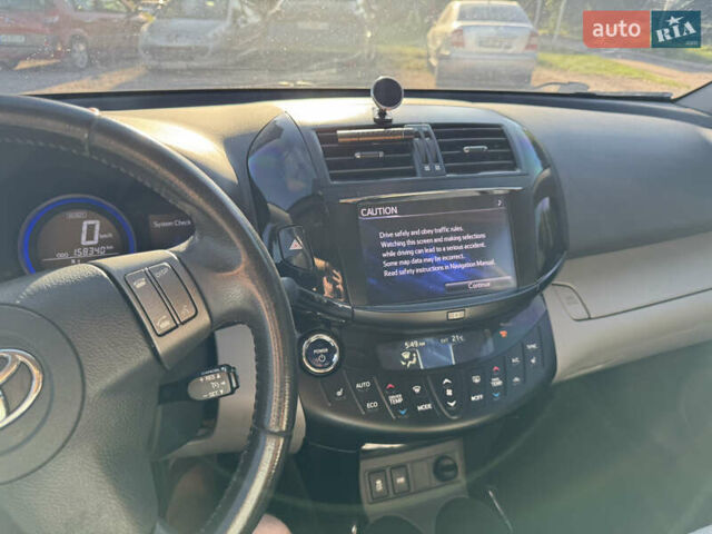 Белый Тойота RAV4 EV, объемом двигателя 0 л и пробегом 159 тыс. км за 10900 $, фото 26 на Automoto.ua
