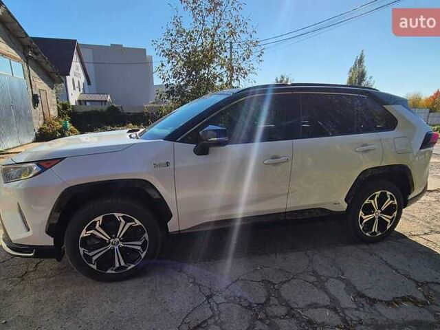 Белый Тойота RAV4 PHEV, объемом двигателя 2.49 л и пробегом 90 тыс. км за 42000 $, фото 2 на Automoto.ua