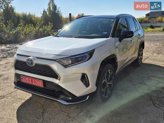 Белый Тойота RAV4 PHEV, объемом двигателя 2.49 л и пробегом 90 тыс. км за 42000 $, фото 1 на Automoto.ua