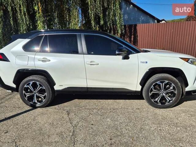 Белый Тойота RAV4 PHEV, объемом двигателя 2.49 л и пробегом 90 тыс. км за 42000 $, фото 3 на Automoto.ua