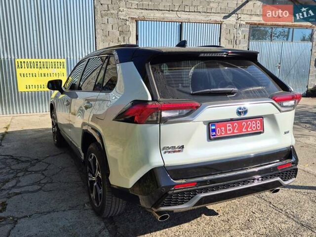Белый Тойота RAV4 PHEV, объемом двигателя 2.49 л и пробегом 90 тыс. км за 42000 $, фото 5 на Automoto.ua