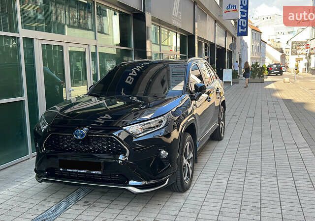 Черный Тойота RAV4 PHEV, объемом двигателя 2.49 л и пробегом 120 тыс. км за 46000 $, фото 4 на Automoto.ua