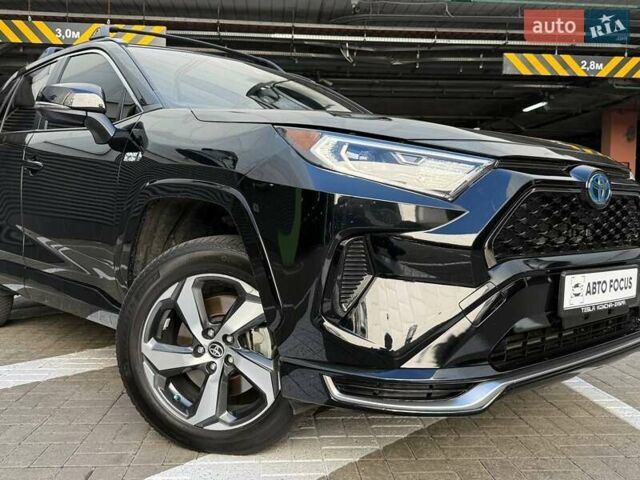 Черный Тойота RAV4 PHEV, объемом двигателя 2.49 л и пробегом 71 тыс. км за 40990 $, фото 1 на Automoto.ua