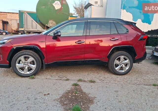 Красный Тойота RAV4 PHEV, объемом двигателя 2.4 л и пробегом 45 тыс. км за 29900 $, фото 3 на Automoto.ua