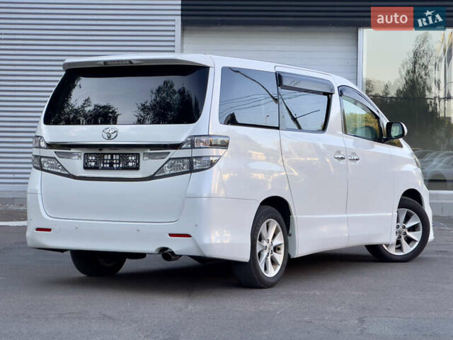 Белый Тойота Веллфаир, объемом двигателя 2.36 л и пробегом 57 тыс. км за 19200 $, фото 2 на Automoto.ua