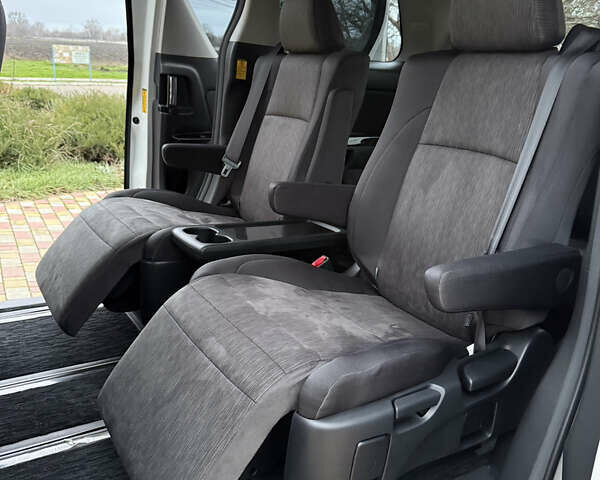 Білий Тойота Веллфаір, об'ємом двигуна 2.36 л та пробігом 69 тис. км за 23500 $, фото 110 на Automoto.ua