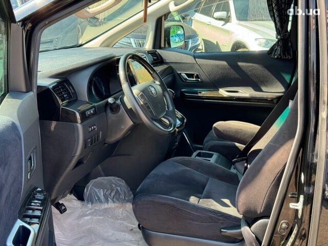 Черный Тойота Веллфаир, объемом двигателя 2.4 л и пробегом 82 тыс. км за 15490 $, фото 17 на Automoto.ua