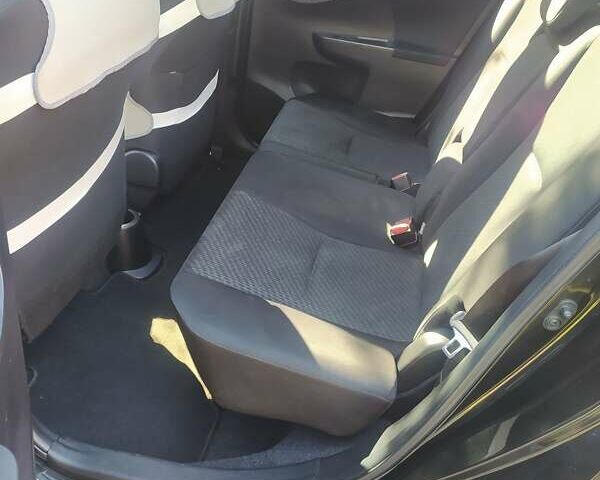 Черный Тойота Verso-S, объемом двигателя 1.3 л и пробегом 294 тыс. км за 6500 $, фото 17 на Automoto.ua