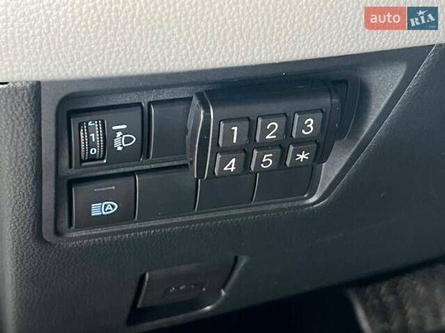 Белый Тойота Yaris Cross, объемом двигателя 1.49 л и пробегом 69 тыс. км за 24900 $, фото 13 на Automoto.ua