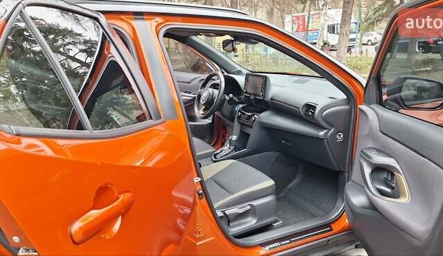Оранжевый Тойота Yaris Cross, объемом двигателя 1.49 л и пробегом 62 тыс. км за 23999 $, фото 9 на Automoto.ua