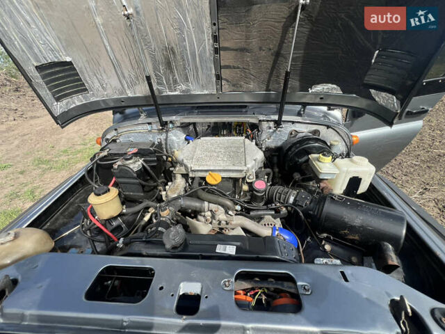 Серый УАЗ 31519, объемом двигателя 2.66 л и пробегом 88 тыс. км за 9000 $, фото 1 на Automoto.ua
