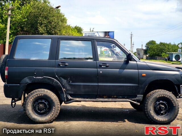 Черный УАЗ 3163 Patriot, объемом двигателя 2.8 л и пробегом 162 тыс. км за 2160 $, фото 3 на Automoto.ua