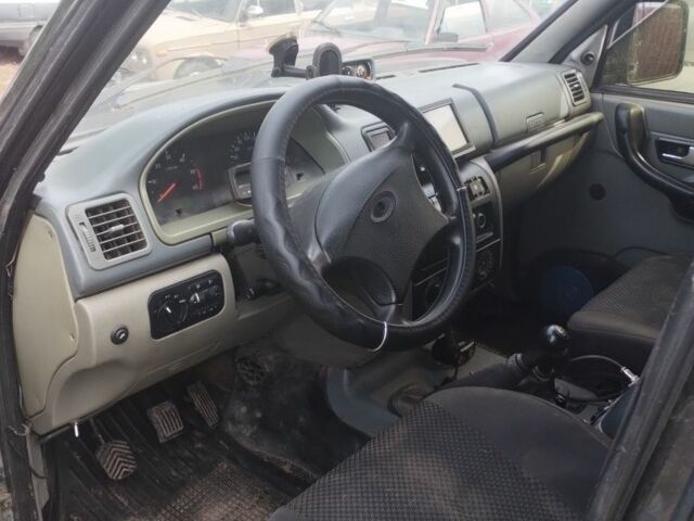 Черный УАЗ 3163 Patriot, объемом двигателя 2.7 л и пробегом 225 тыс. км за 5000 $, фото 7 на Automoto.ua