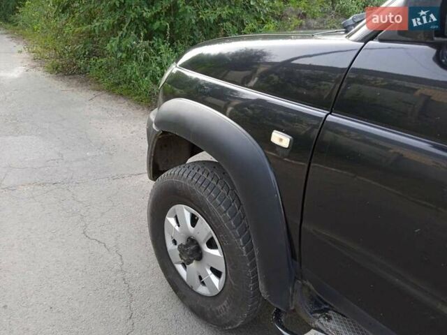 Черный УАЗ 3163 Patriot, объемом двигателя 2.7 л и пробегом 297 тыс. км за 6600 $, фото 3 на Automoto.ua