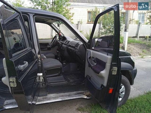 Черный УАЗ 3163 Patriot, объемом двигателя 2.7 л и пробегом 297 тыс. км за 6600 $, фото 5 на Automoto.ua