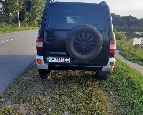 Черный УАЗ 3163 Patriot, объемом двигателя 2.7 л и пробегом 260 тыс. км за 5300 $, фото 3 на Automoto.ua