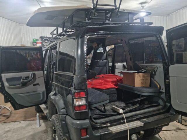 Черный УАЗ 3163 Patriot, объемом двигателя 2.7 л и пробегом 100 тыс. км за 10500 $, фото 3 на Automoto.ua