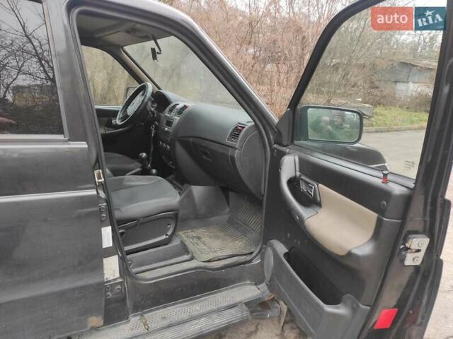 Черный УАЗ 3163 Patriot, объемом двигателя 2.24 л и пробегом 157 тыс. км за 6300 $, фото 7 на Automoto.ua