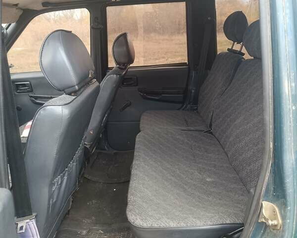 Зеленый УАЗ 3163 Patriot, объемом двигателя 2.7 л и пробегом 250 тыс. км за 3700 $, фото 4 на Automoto.ua