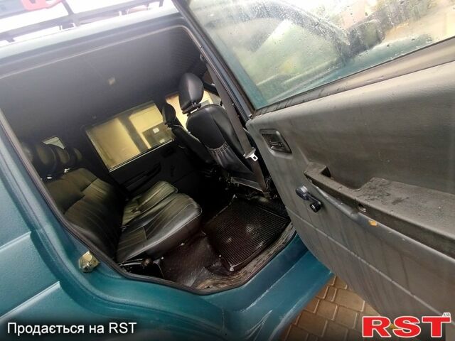 Синий УАЗ Патриот, объемом двигателя 2.7 л и пробегом 220 тыс. км за 5000 $, фото 9 на Automoto.ua