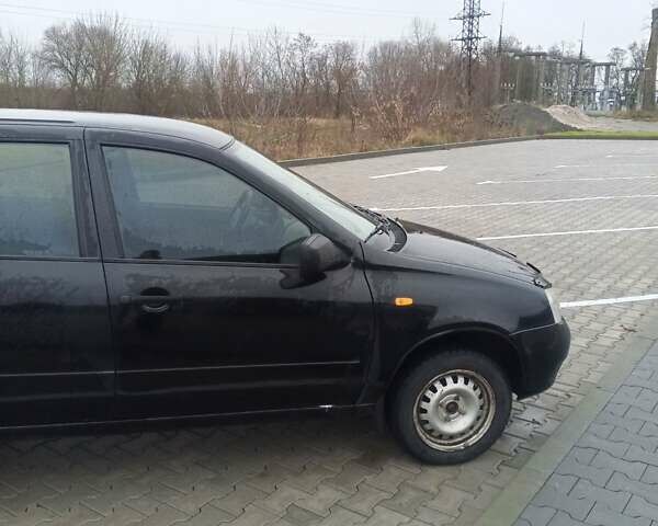 Черный ВАЗ 1117 Калина, объемом двигателя 1.6 л и пробегом 204 тыс. км за 2750 $, фото 5 на Automoto.ua