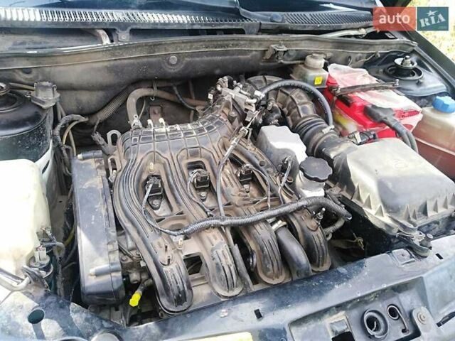 Черный ВАЗ 1117 Калина, объемом двигателя 1.4 л и пробегом 128 тыс. км за 2300 $, фото 1 на Automoto.ua