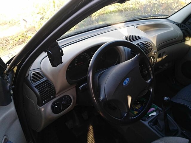 Чорний ВАЗ 1117 Калина, об'ємом двигуна 1.4 л та пробігом 128 тис. км за 2300 $, фото 4 на Automoto.ua