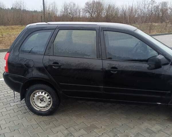 Черный ВАЗ 1117 Калина, объемом двигателя 1.6 л и пробегом 204 тыс. км за 2750 $, фото 4 на Automoto.ua