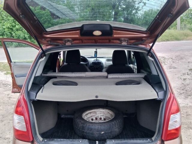 Коричневый ВАЗ 1117 Калина, объемом двигателя 1.4 л и пробегом 312 тыс. км за 2300 $, фото 14 на Automoto.ua