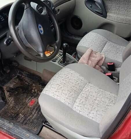 Красный ВАЗ 1117 Калина, объемом двигателя 1.6 л и пробегом 150 тыс. км за 2500 $, фото 4 на Automoto.ua