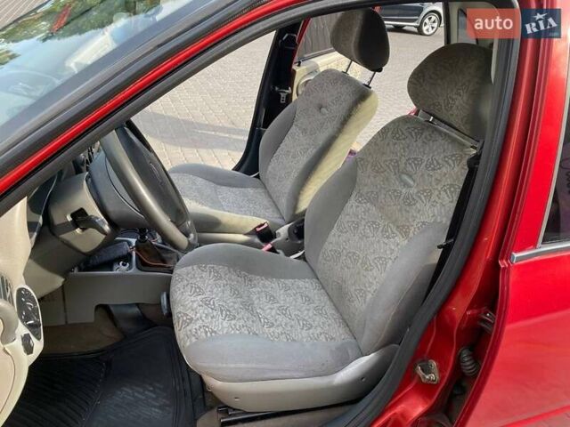 Красный ВАЗ 1117 Калина, объемом двигателя 1.6 л и пробегом 223 тыс. км за 2100 $, фото 10 на Automoto.ua