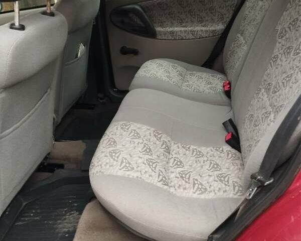 Красный ВАЗ 1117 Калина, объемом двигателя 1.6 л и пробегом 260 тыс. км за 1900 $, фото 4 на Automoto.ua