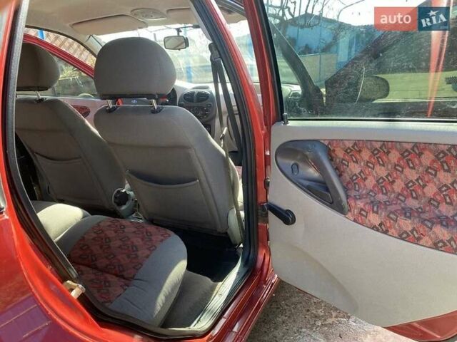 Красный ВАЗ 1117 Калина, объемом двигателя 1.6 л и пробегом 136 тыс. км за 2100 $, фото 11 на Automoto.ua