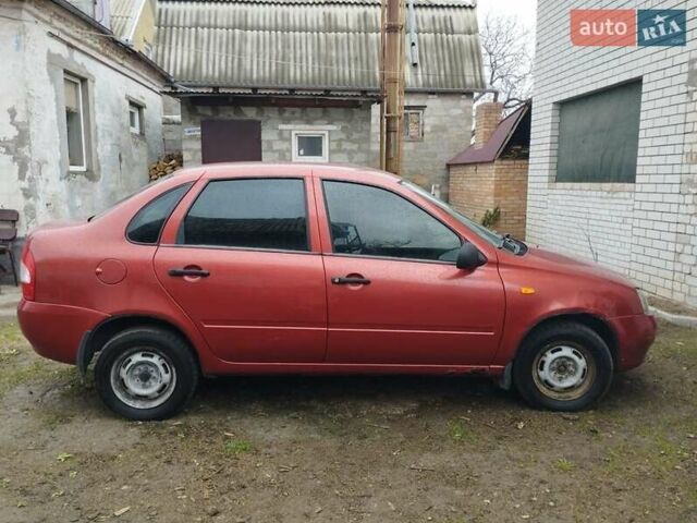 Красный ВАЗ 1117 Калина, объемом двигателя 1.6 л и пробегом 260 тыс. км за 1900 $, фото 1 на Automoto.ua