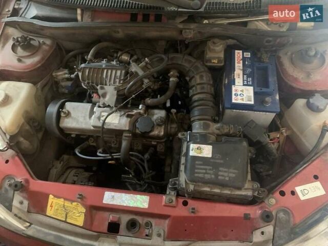 Красный ВАЗ 1117 Калина, объемом двигателя 1.6 л и пробегом 260 тыс. км за 1900 $, фото 6 на Automoto.ua