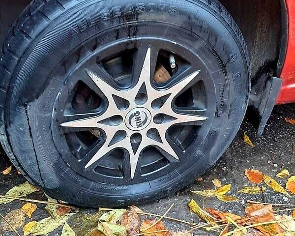 Красный ВАЗ 1117 Калина, объемом двигателя 1.6 л и пробегом 124 тыс. км за 2800 $, фото 10 на Automoto.ua