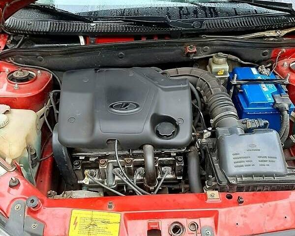 Красный ВАЗ 1117 Калина, объемом двигателя 1.6 л и пробегом 124 тыс. км за 2800 $, фото 6 на Automoto.ua