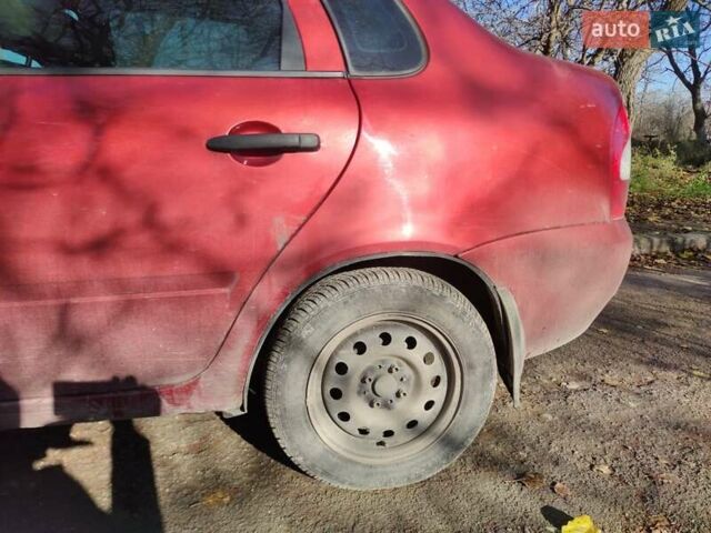 Красный ВАЗ 1117 Калина, объемом двигателя 1.4 л и пробегом 196 тыс. км за 1250 $, фото 5 на Automoto.ua
