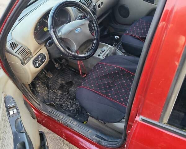 Красный ВАЗ 1117 Калина, объемом двигателя 1.6 л и пробегом 250 тыс. км за 1650 $, фото 6 на Automoto.ua