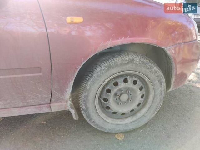 Красный ВАЗ 1117 Калина, объемом двигателя 1.4 л и пробегом 196 тыс. км за 1250 $, фото 2 на Automoto.ua