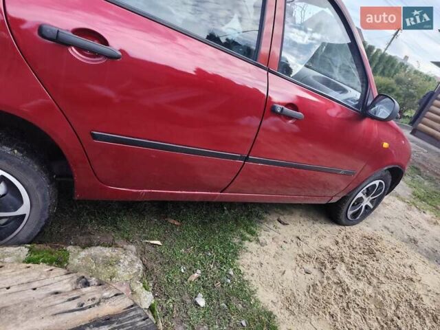 Красный ВАЗ 1117 Калина, объемом двигателя 1.6 л и пробегом 250 тыс. км за 1650 $, фото 10 на Automoto.ua