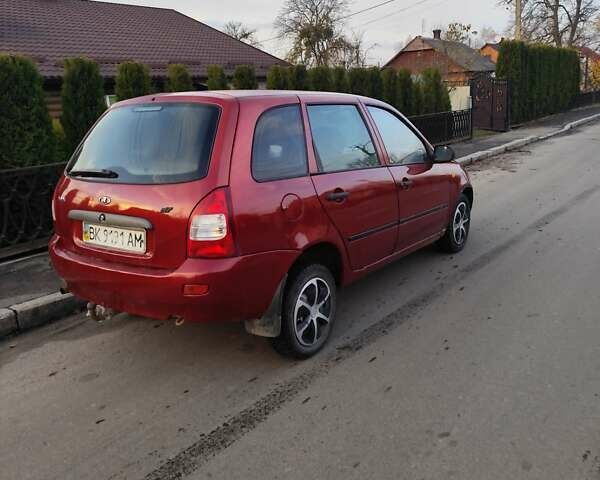 Червоний ВАЗ 1117 Калина, об'ємом двигуна 1.6 л та пробігом 250 тис. км за 1714 $, фото 1 на Automoto.ua