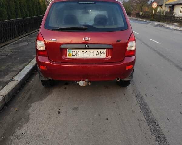 Красный ВАЗ 1117 Калина, объемом двигателя 1.6 л и пробегом 250 тыс. км за 1650 $, фото 3 на Automoto.ua